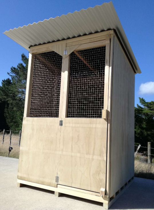 Large walk in chicken coop made from wood with double doors